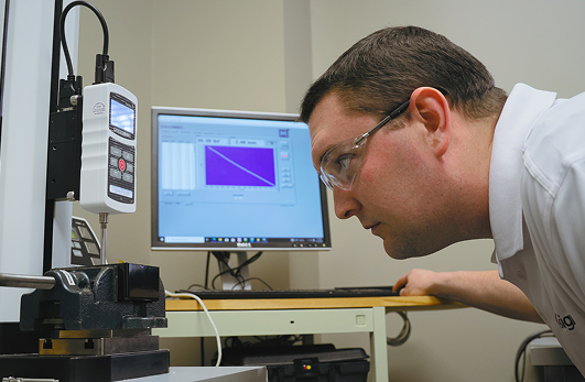 Indesign mechanical engineer monitoring a materials stress test