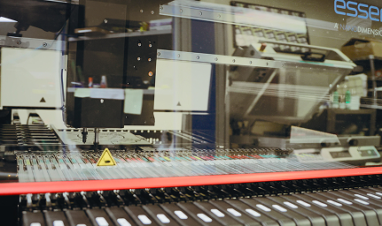 Large-scale firmware testing equipment at Indesign's facility
