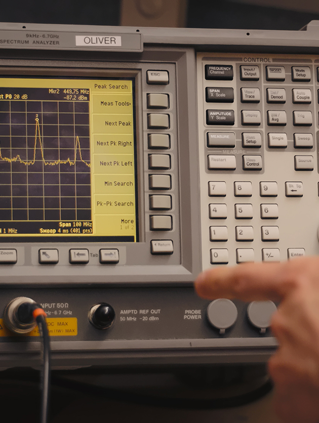 Spectrum analyzer displaying a signal peak during RF testing